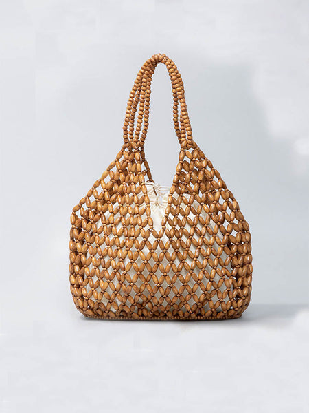 Bolso de mano tejido con cuentas de madera hecho a mano